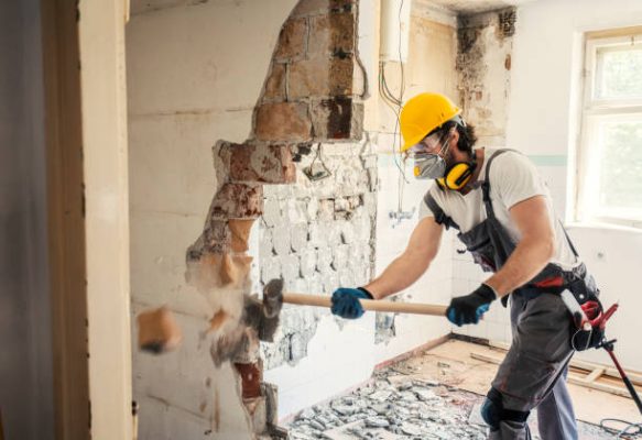 San Diego Drywall Contractors - worker using a hammer